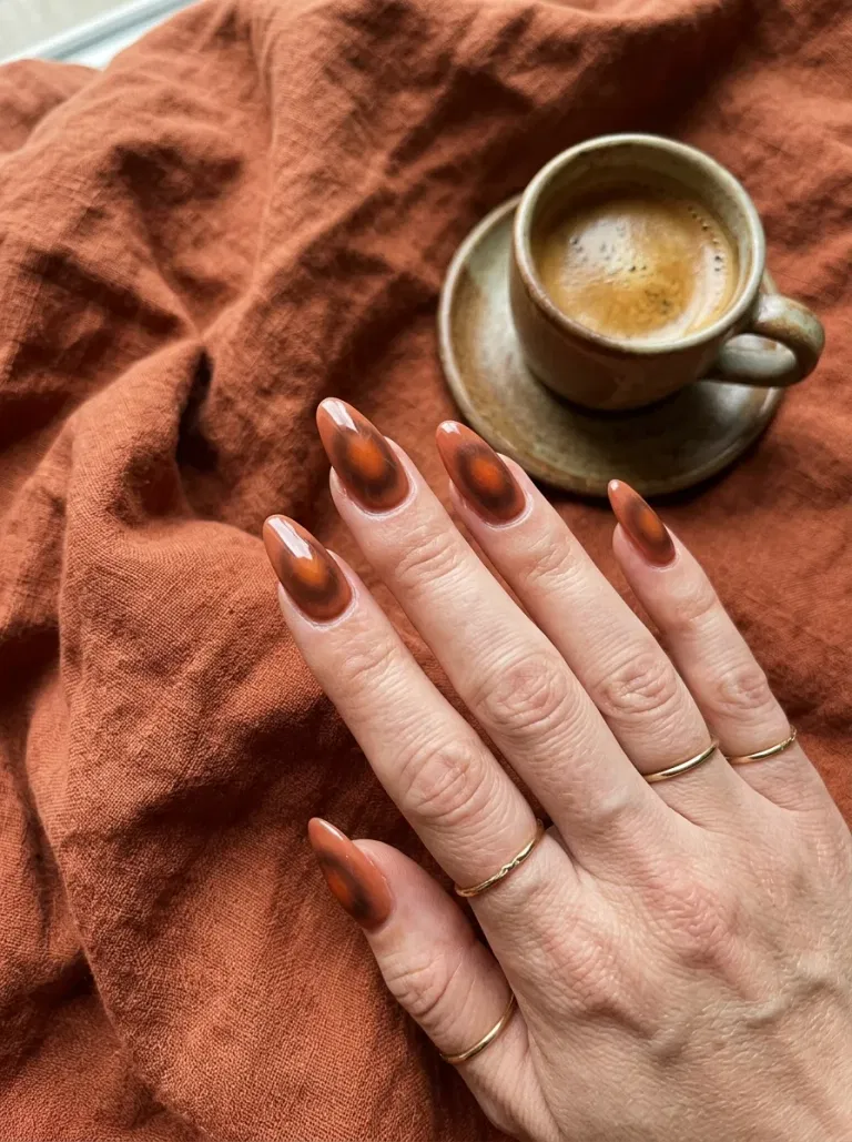 Cinnamon Aura Center nail design