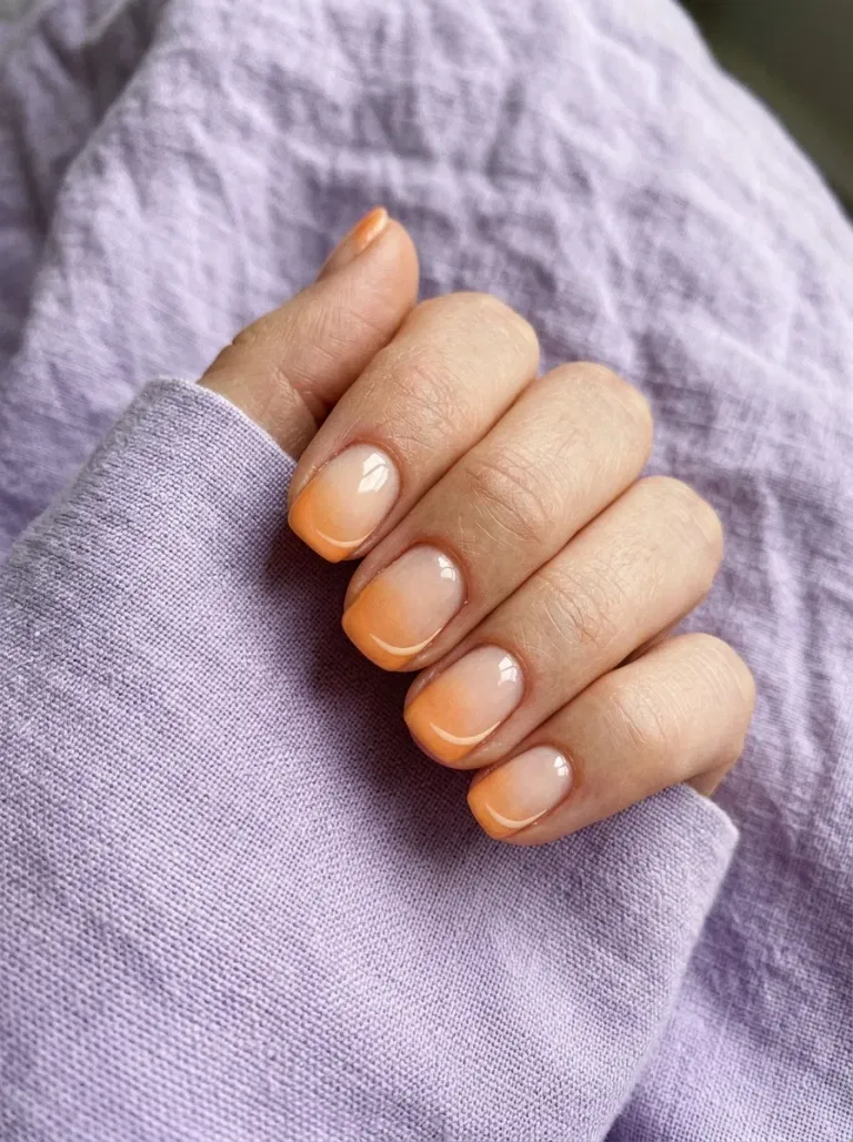 Soft Tangerine Aura French nail design